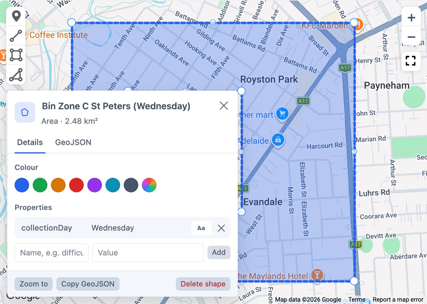 The shape panel for a bin collection zone: its name, “Area · 2.48 km²”, colour swatches, a collectionDay property, and Zoom to, Copy GeoJSON and Delete shape buttons